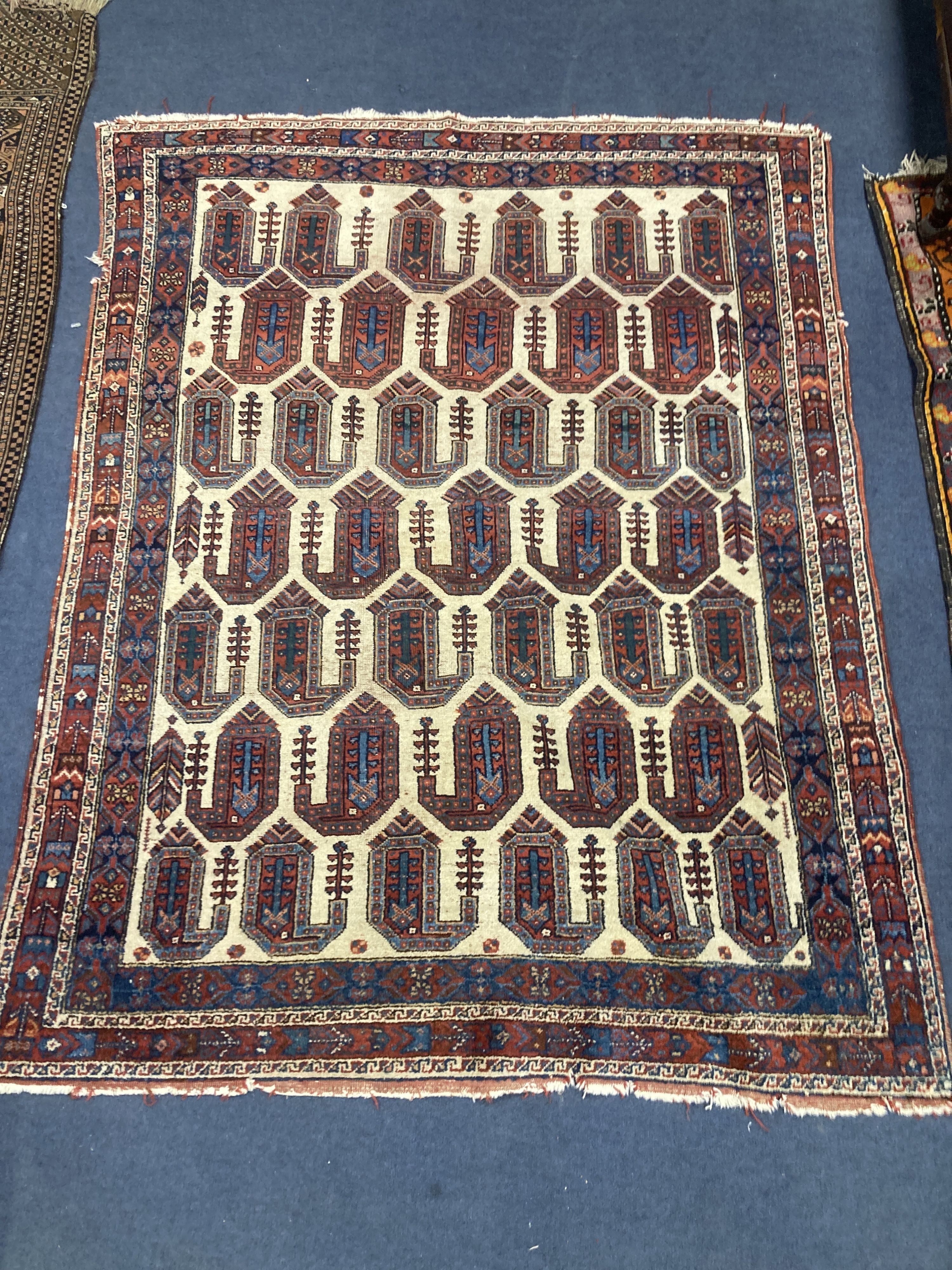 A polychrome Caucasian rug, pointed gulls, 140 x 116cm